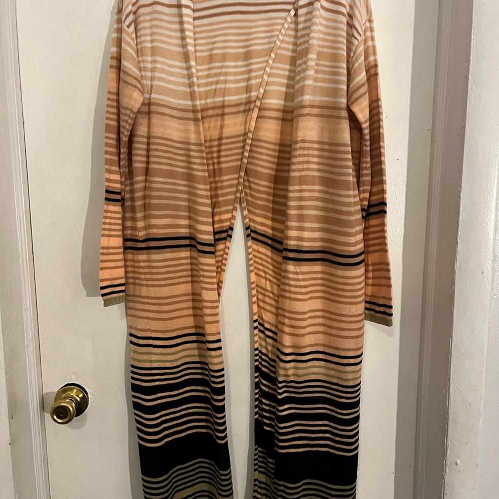 Cardigan, that splits up the back from, “NY & CO.”